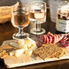 Norwegian Baked knekkebrød crispbread on a charcuterie board with wine