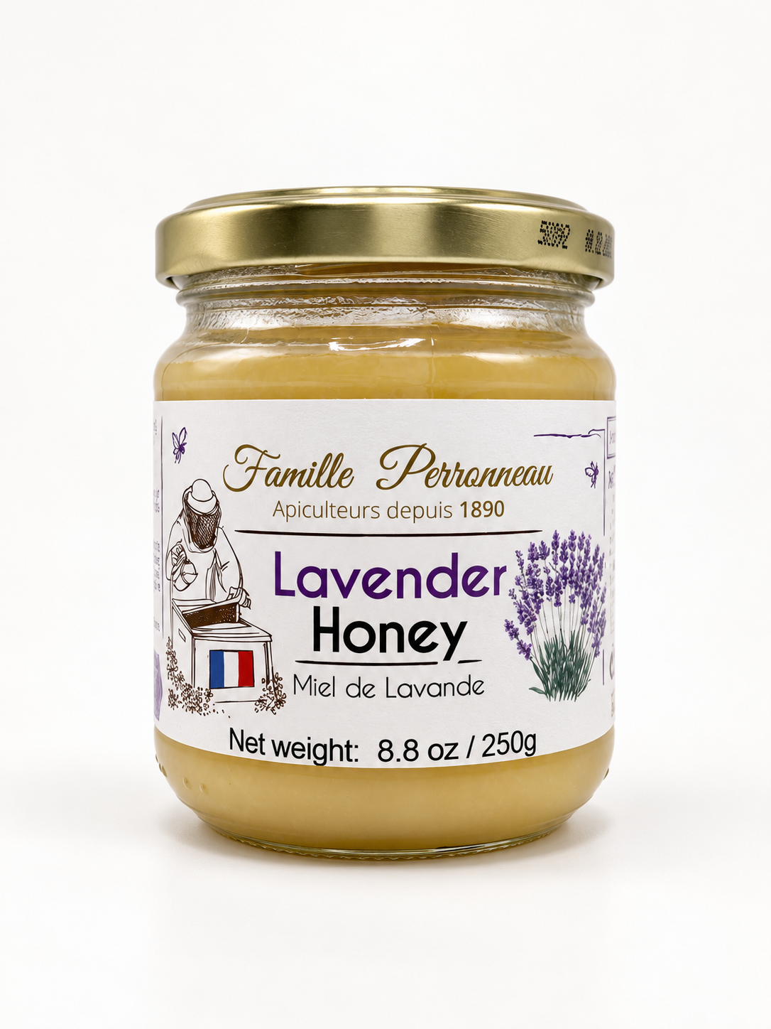 A glass jar 8.8 oz/ 250g of famille perronnau lavender honey.