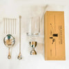 All 10 pieces in the A Bar Above set: mixing glass, bell jigger, julep strainer, spiral bar spoon and six cocktail picks, with box.