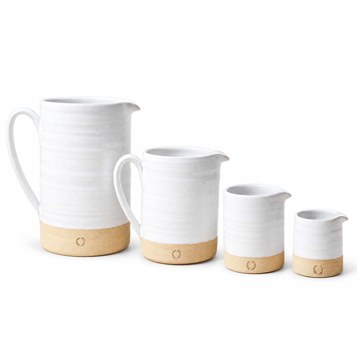 Silo Pitcher sizes compared: Large, Medium, Small and Petite from left to right; sold individually