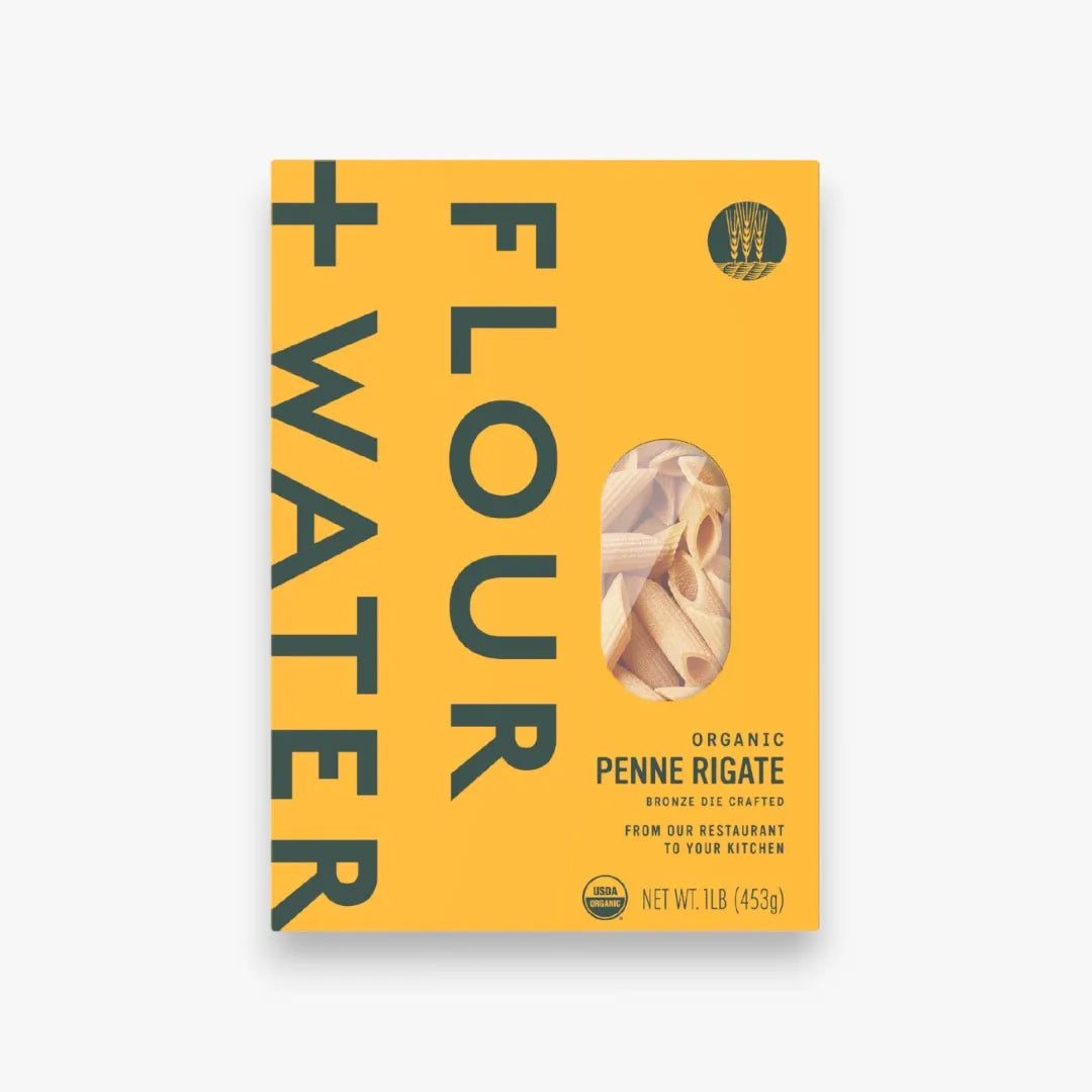 Flour + Water Organic Penne Rigate bronze-die pasta in its yellow box