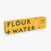 Flour + Water Organic Spaghetti bronze-die pasta in its yellow 16 oz box