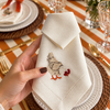 The Country Table: embroidered hen napkins and striped cotton canvas placemats, made in Brazil