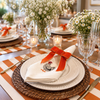 The Country Table: embroidered hen napkins and striped cotton canvas placemats, made in Brazil