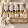 The French Table Box with four Andrésy preserves, two Famille Perronneau honeys and two L’Épicurien mustards in a wood gift box with Lello ribbon